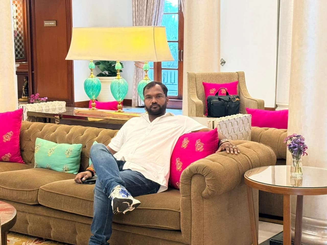Shiwendra seated indoors